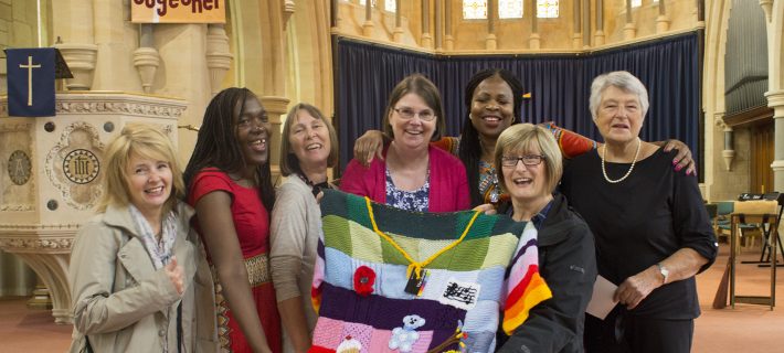 A community group holding a craftwork in Black History Month Competition.