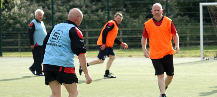 Football players in a field.
