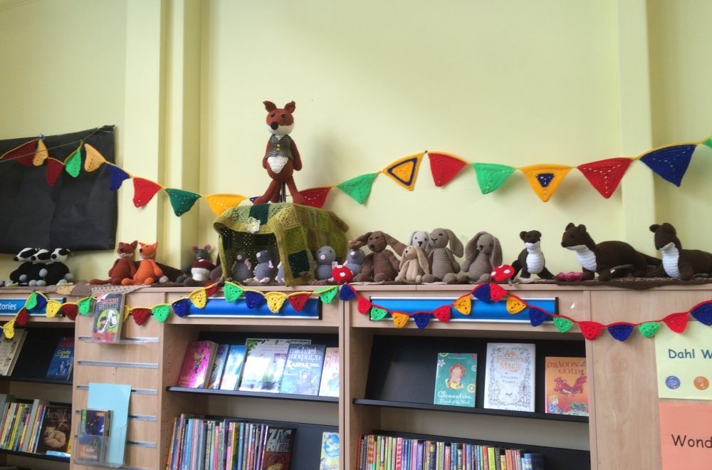 Crochets on a bookcase.