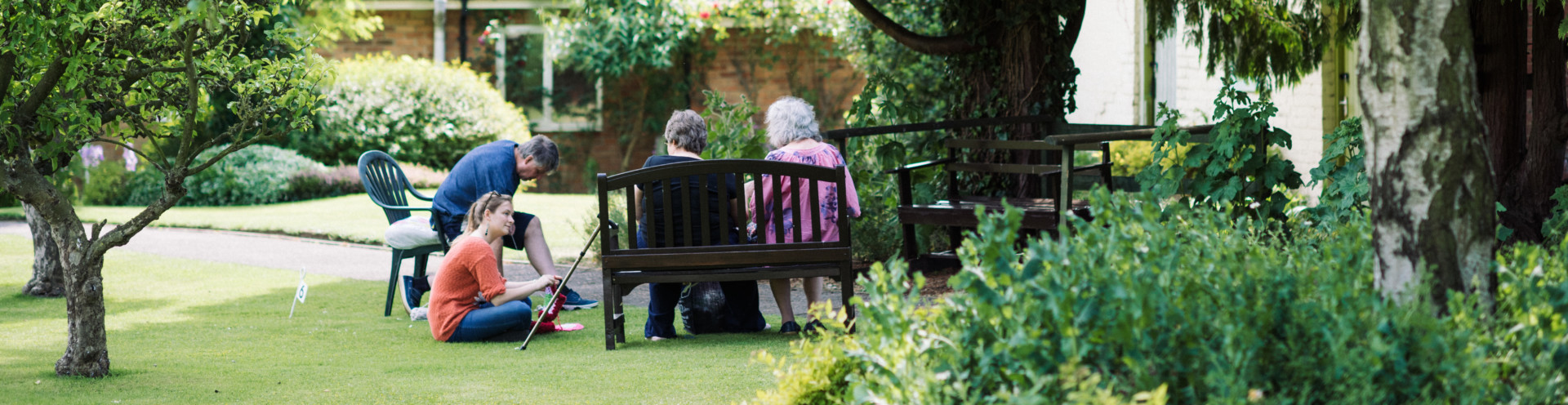 Manor Gardens residents socialising in a community space.