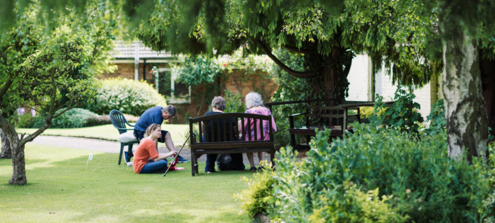 Manor Gardens residents socialising in a community space.