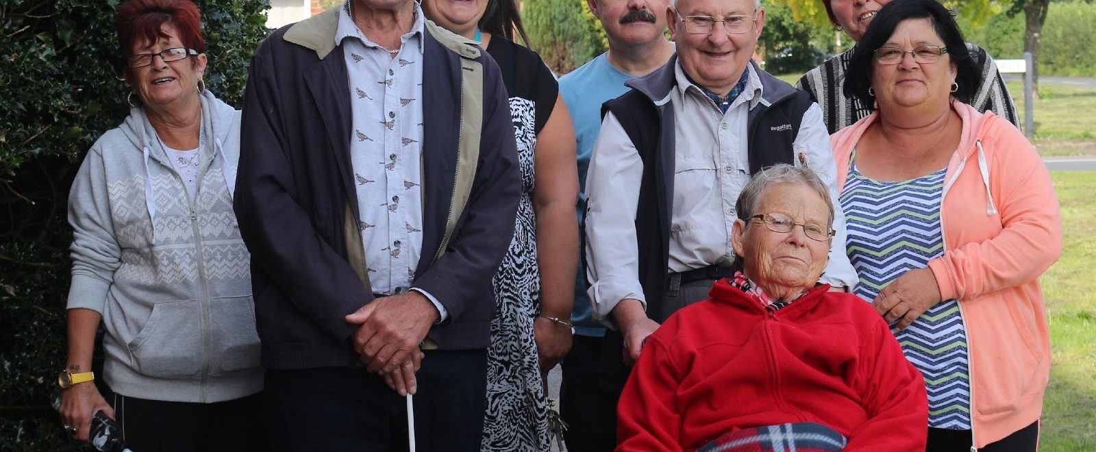 A group of people smiling at the camera.