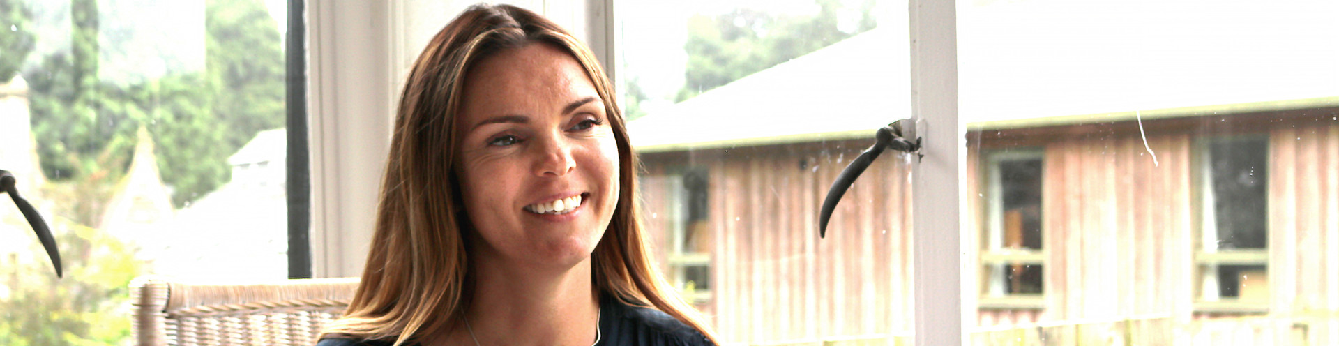 A Barnwood Trust grantee smiling at the camera.