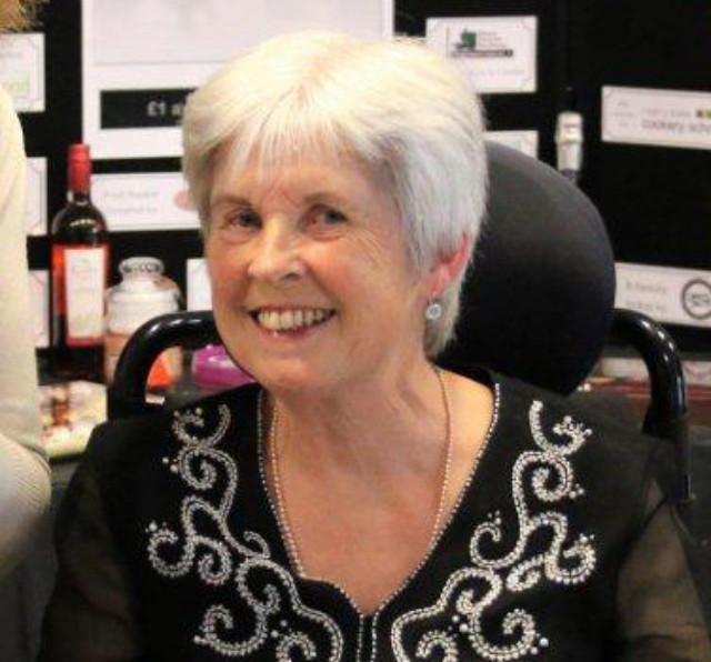 Dr Jean Waters smiling at the camera.