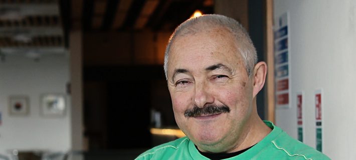 Barry smiling at the camera