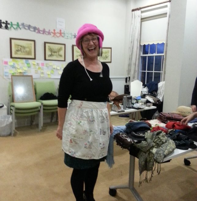 Woman smiling at the camera on the swap evening