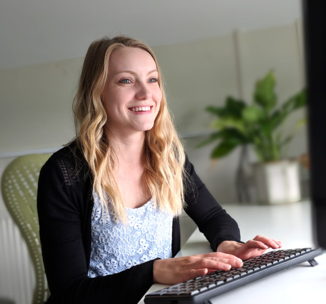 Barnwood Trust team member Anna sitting at her desk