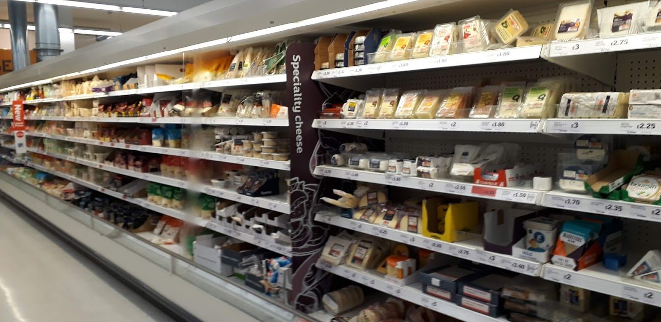 Cheese aisle on the grocery shop