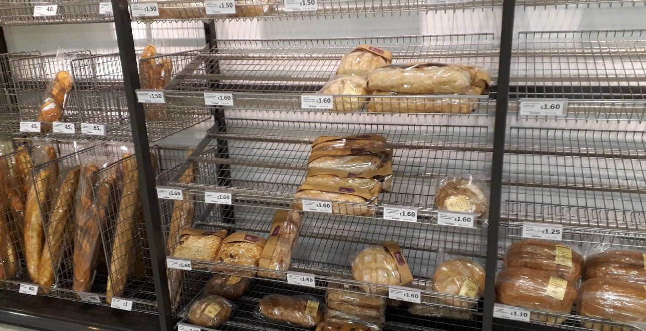 Breads in plastic packages in the grocery shop