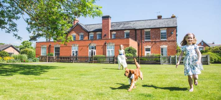 Children playing at the shared gardens of Manor Gardens.