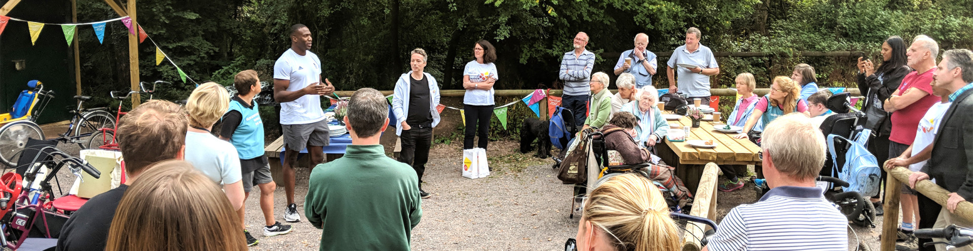 The Wheels For All team and community members socialising at the community space in Cannop, Forest of Dean.