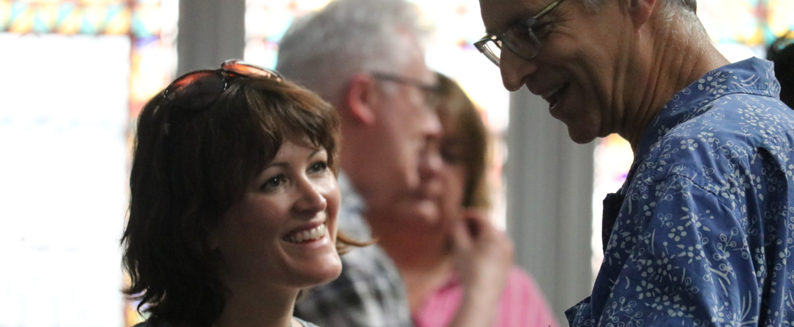 Attendees socialising in the participatory community building event