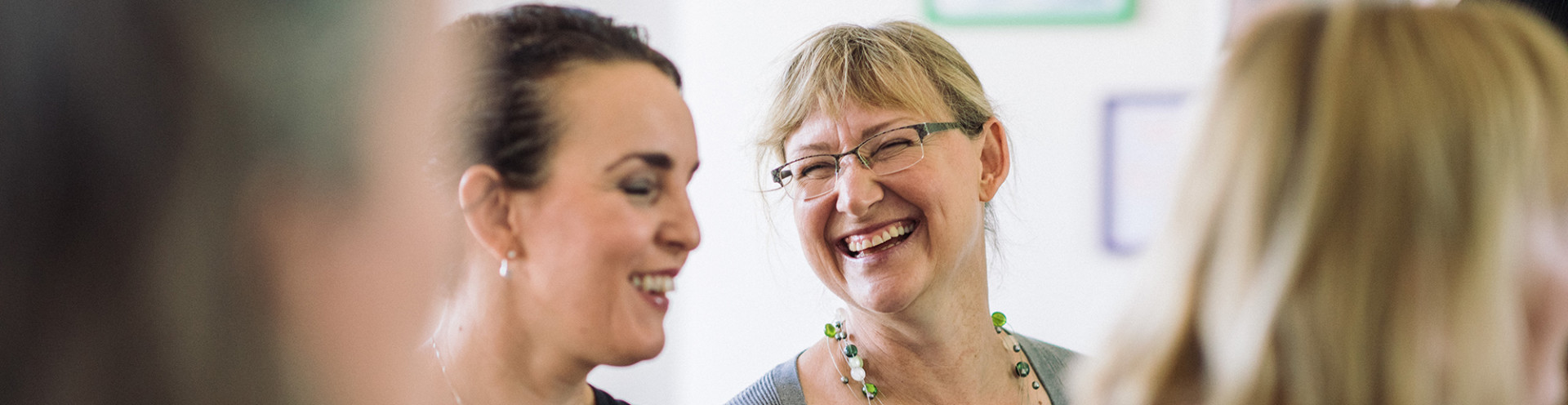 Cheerful women at Barnwood Trust grants drop-in sessions