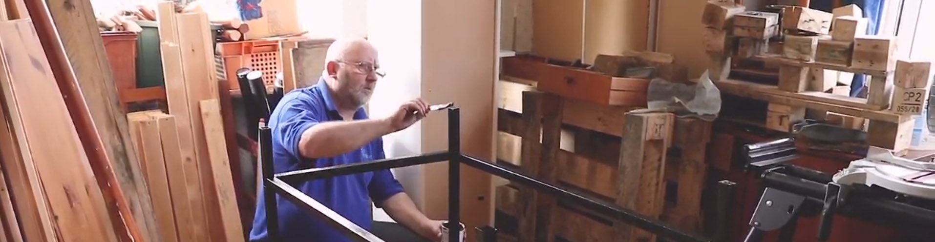 A community member standing at Cotswold Community Men's Shed