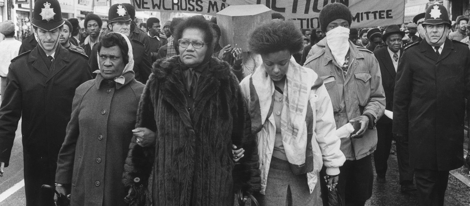 Photo of grieving protesters marching in 1981