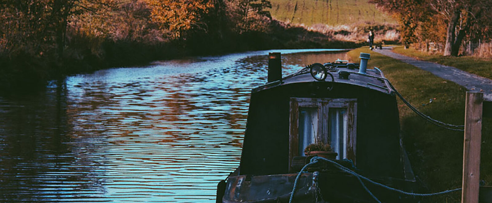 Image of a Cotswolds canal with a canal boat