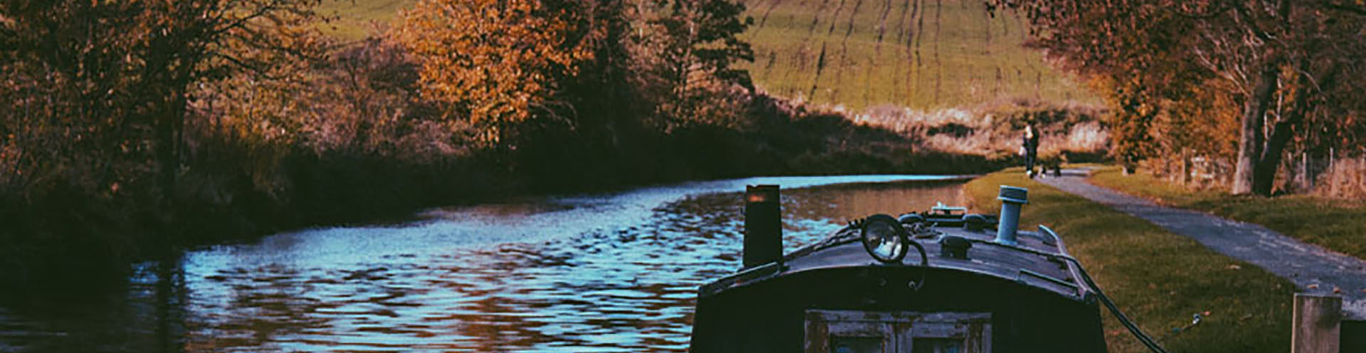 Image of a Cotswolds canal with a canal boat