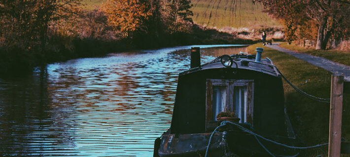 Image of a Cotswolds canal with a canal boat