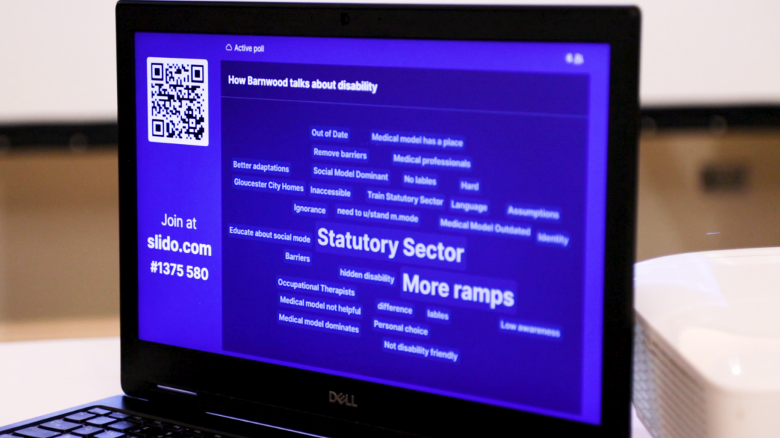 Screenshot of the screen showing Slido word cloud used to capture the thoughts of discussions on tables. 